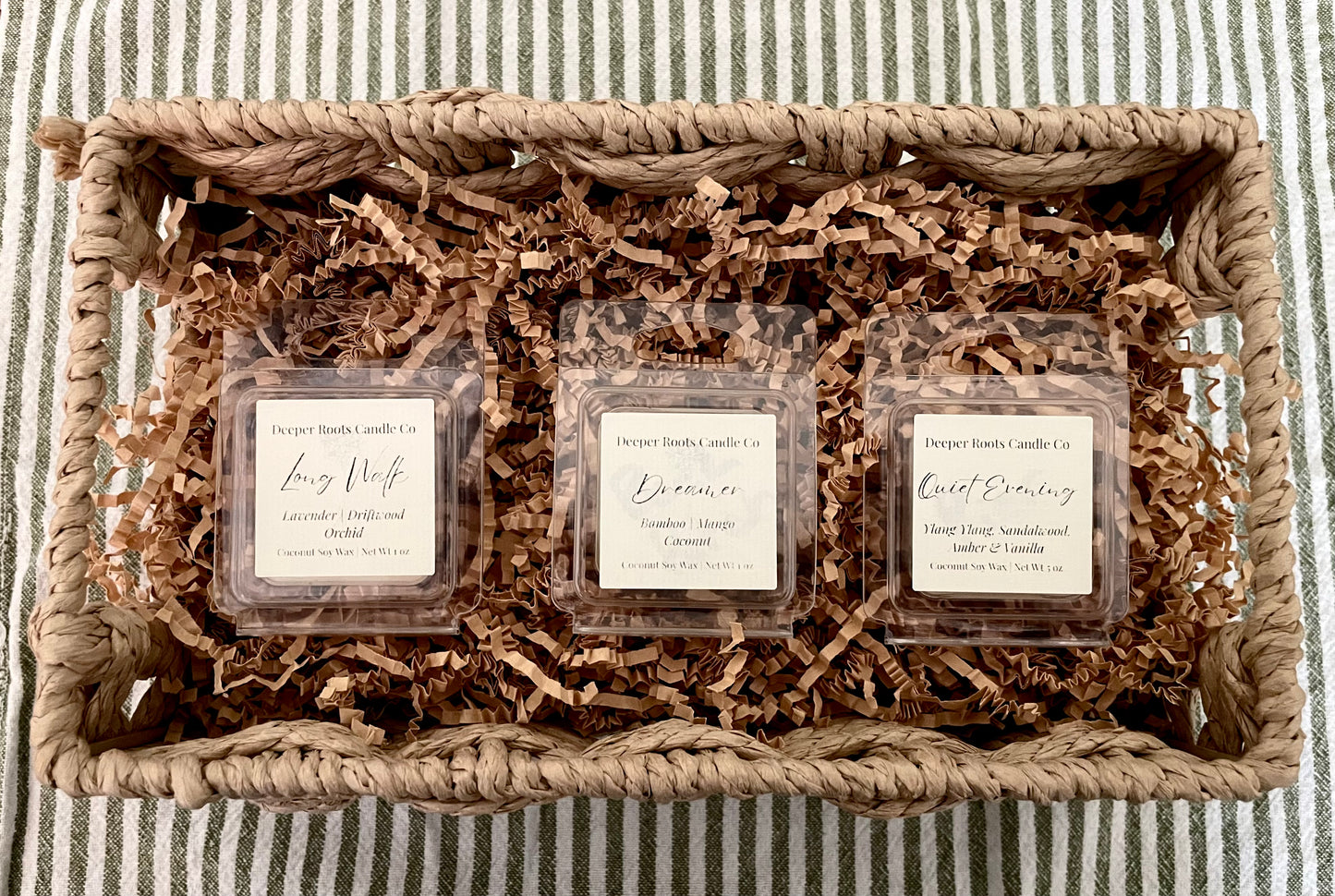 Discovery Kit featuring Long Walk, Quiet Evening, and Dreamer fragrance samples, shown in a gift basket